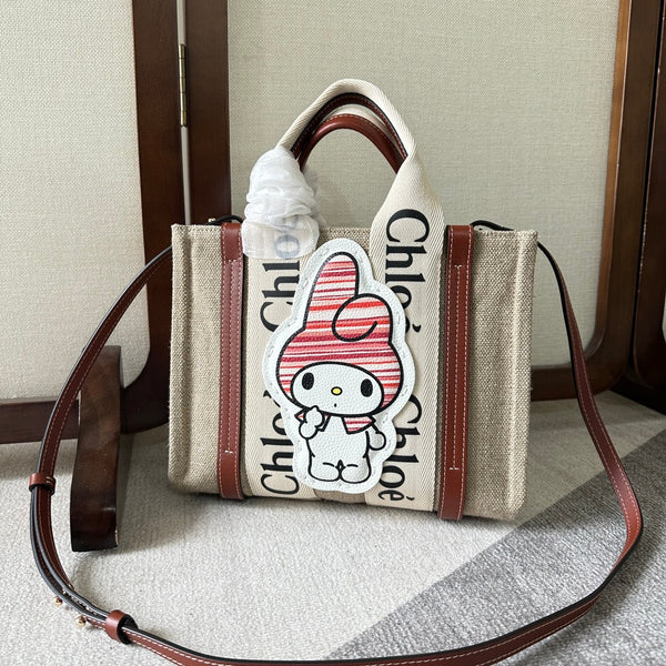 MY MELODY SMALL WOODY TOTE BAG 26.5 IN NATURAL FIBERS BEIGE WEBBING BROWN CALFSKIN